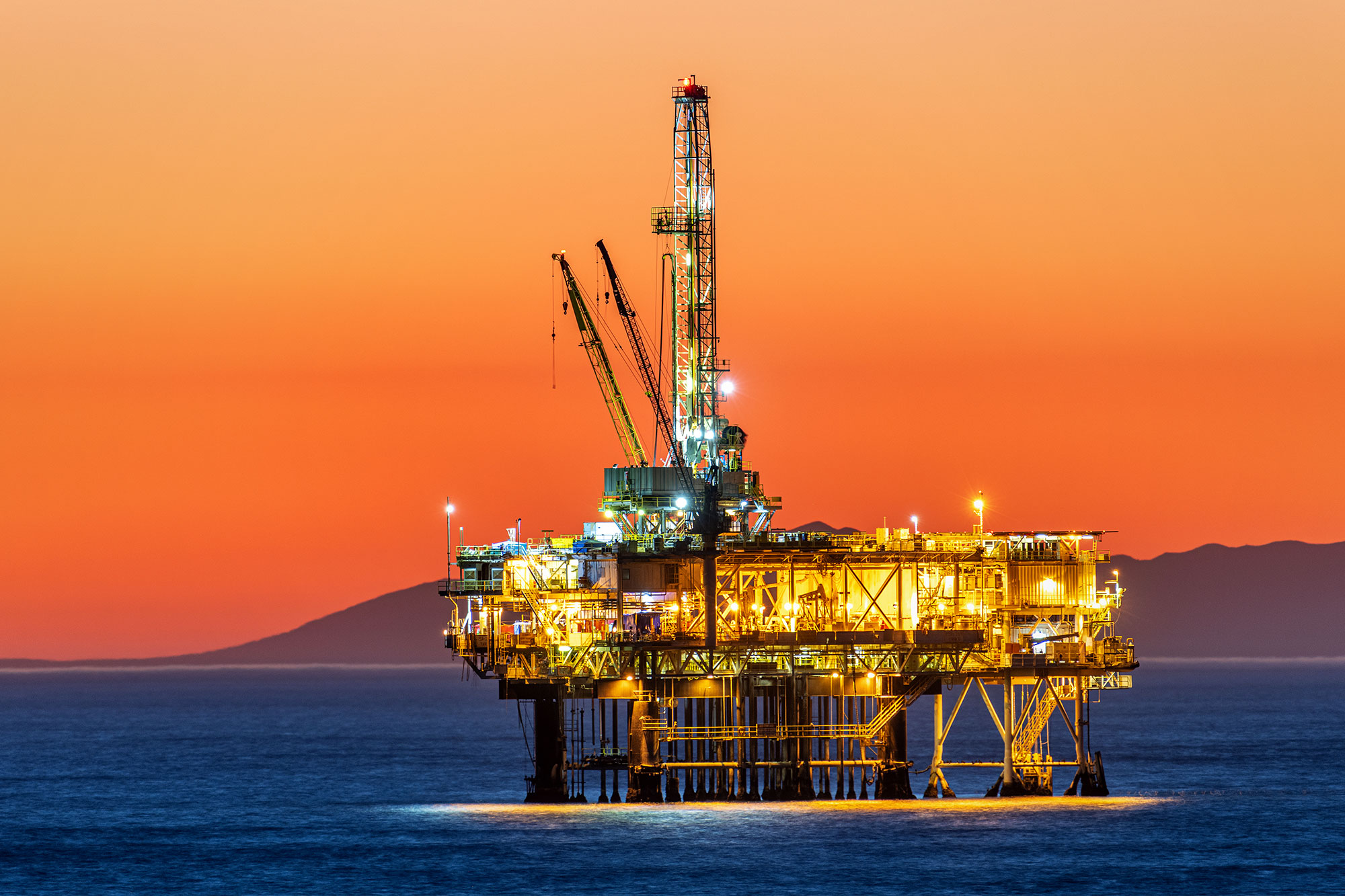 Offshore oil platform at dusk