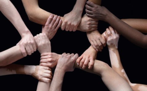 hands holding wrists | Bentley Systems | Infrastructure Engineering Software Company hands holding wrists