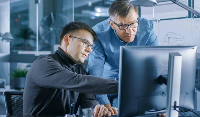 engineers working on computer