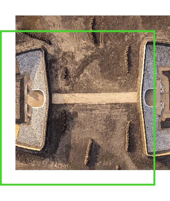An aerial view of a building with a sand pit in the middle. | Bentley Systems | Infrastructure Engineering Software Company An aerial view of a building with a sand pit in the middle.