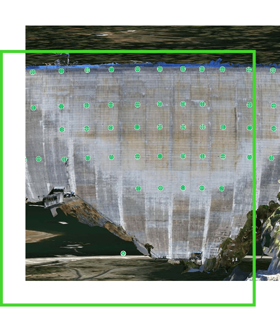 An image of a dam with green dots on it. | Bentley Systems | Infrastructure Engineering Software Company An image of a dam with green dots on it.